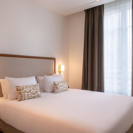Le Lampika Hotel Париж Номер фото